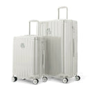 Duo of GYL Intemporelle sand hard suitcases with ribbed shells and telescopic handles. #sand_color