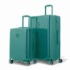 Duo of GYL Intemporelle water green rigid suitcases with ribbed shells and telescopic handles. #color_green