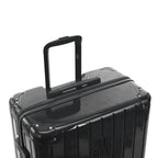 GYL telescopic trolley handle deployed on the Intemporelle dark gray polycarbonate suitcase. #color_dark gray