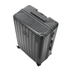 Angled view of the dark gray GYL Intemporelle hardshell suitcase with reinforced corners and shiny ribbed shell. #color_dark gray