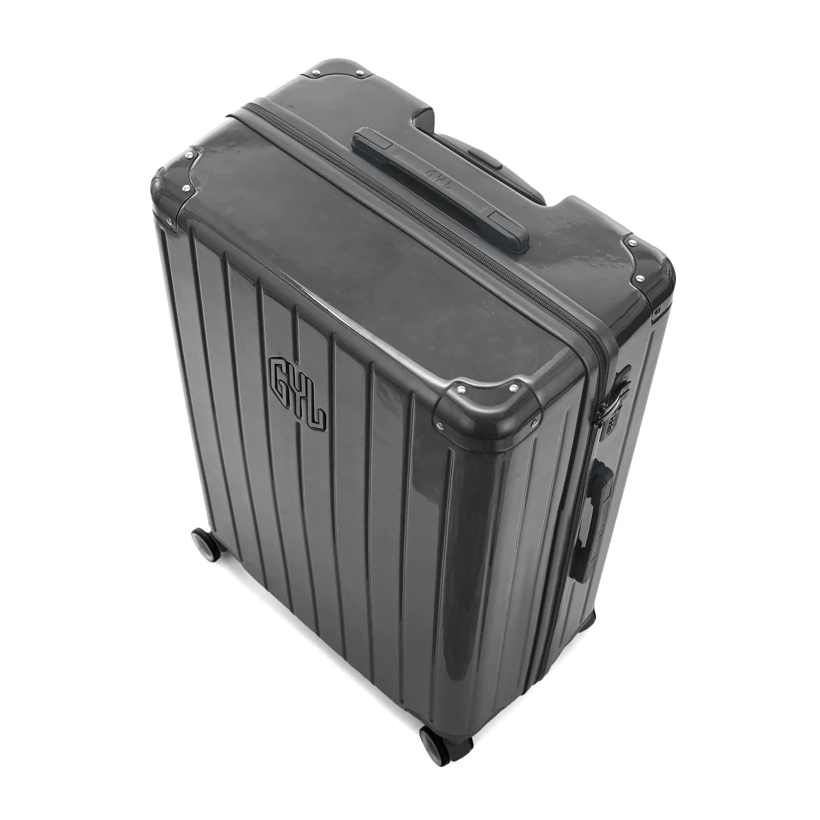 Angled view of the dark gray GYL Intemporelle hardshell suitcase with reinforced corners and shiny ribbed shell. #color_dark gray