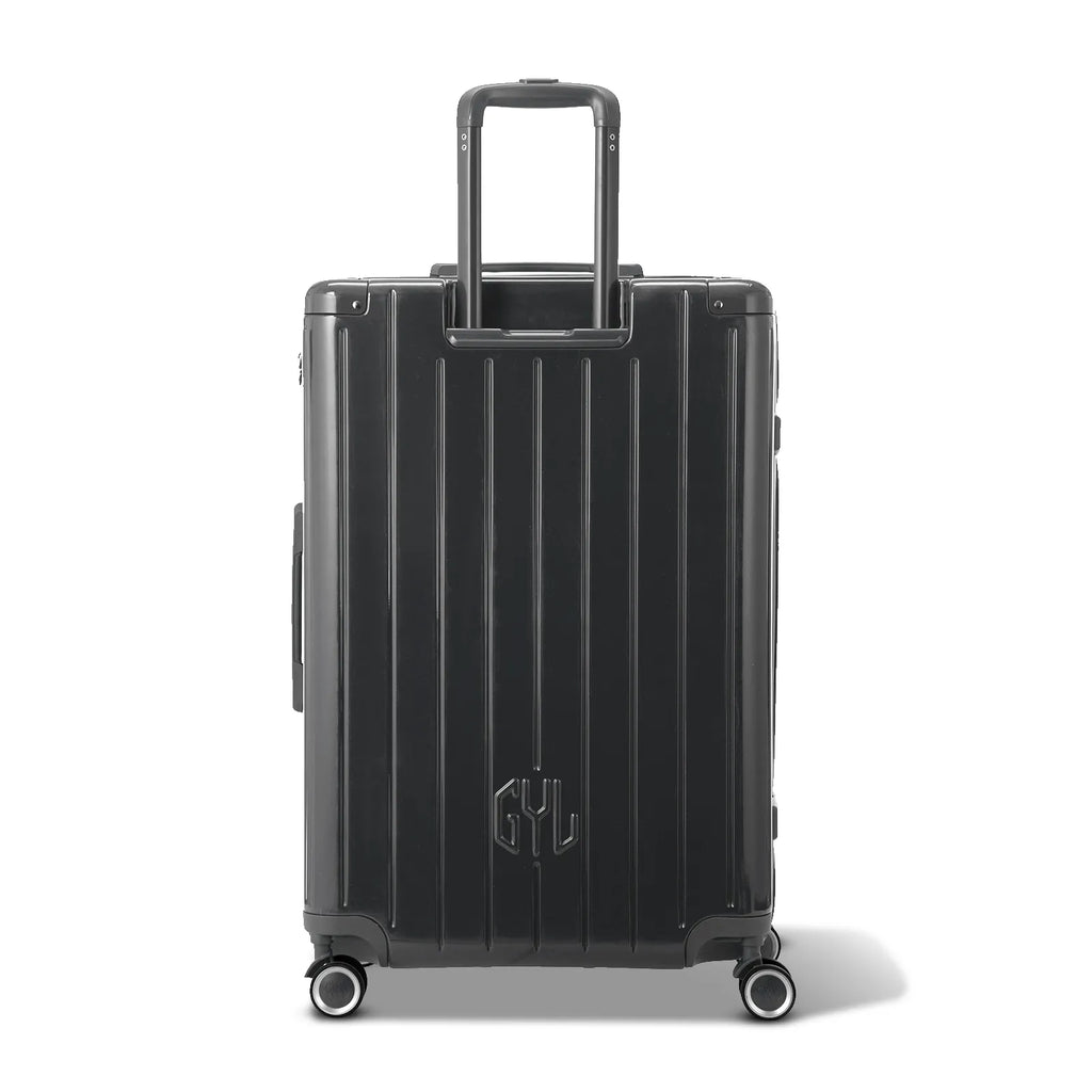 Rear view of the dark gray GYL Intemporelle hardshell suitcase with integrated handles and swivel casters. #color_dark gray