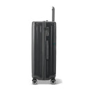 Side view of the dark gray GYL Intemporelle hard suitcase with telescopic handle and TSA closure. #color_dark gray