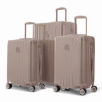 Trio de valises rigides GYL Intemporelle orange poudré avec coques nervurées et poignées télescopiques.  #couleur_orange poudre