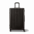 Front view of the GYL Intemporelle black rigid suitcase, embossed logo and 360 degree wheels. #black_color