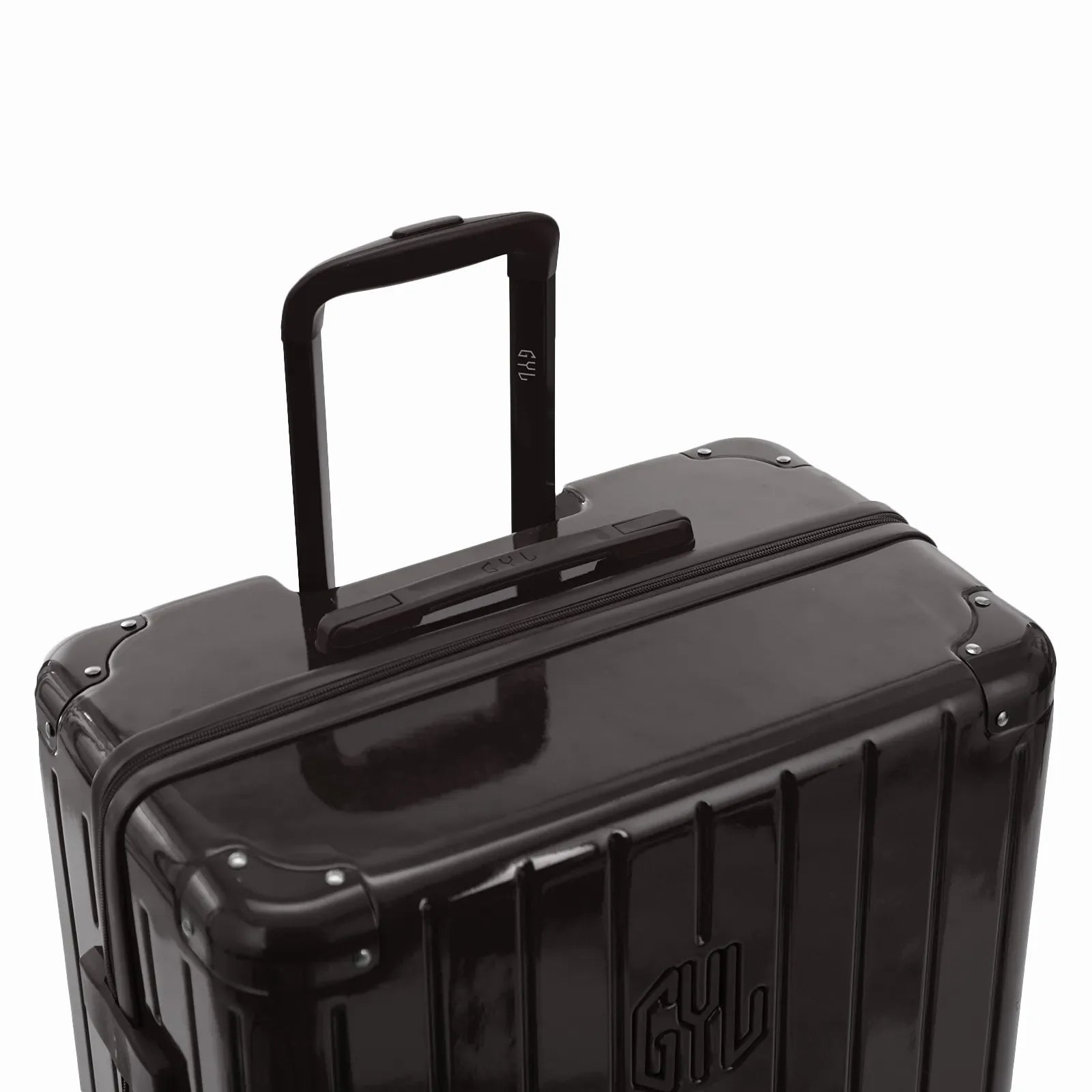 GYL telescopic trolley handle deployed on the Intemporelle black polycarbonate suitcase. #black_color