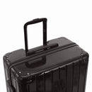 GYL telescopic trolley handle deployed on the Intemporelle black polycarbonate suitcase. #black_color