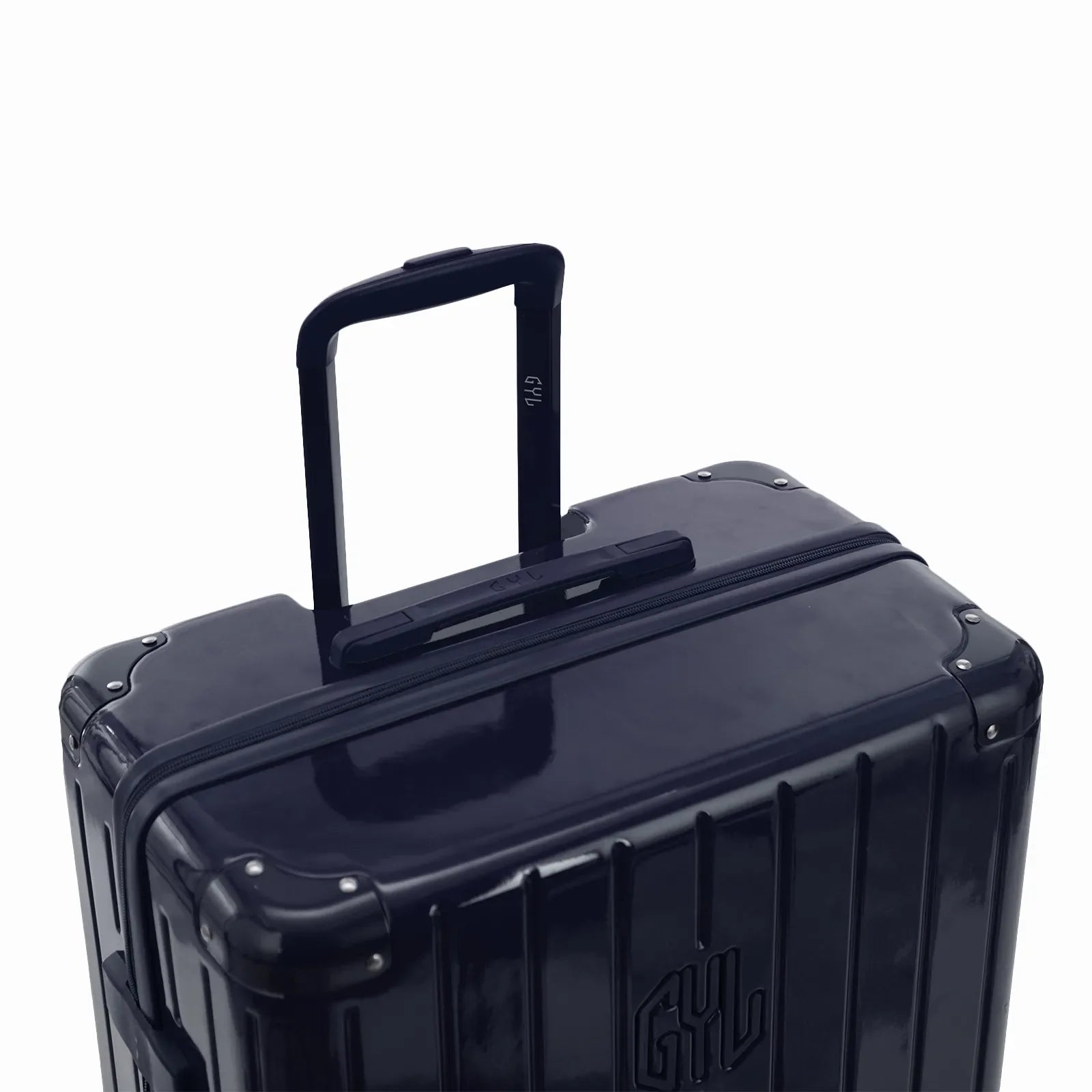 GYL telescopic trolley handle deployed on the Intemporelle marine polycarbonate suitcase. #navy_color