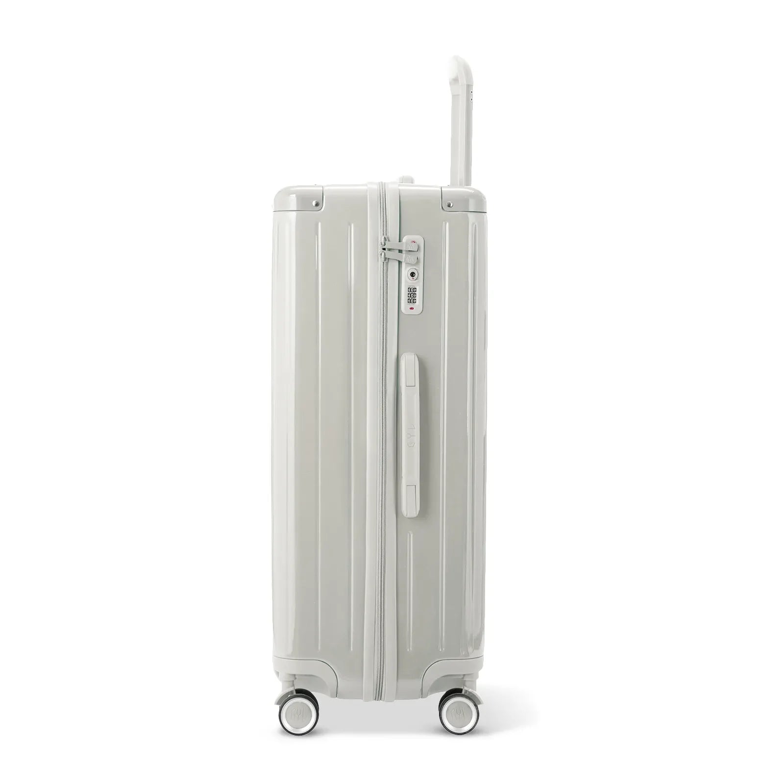Side view of the GYL Intemporelle sand hard suitcase with telescopic handle and TSA closure. #sand_color