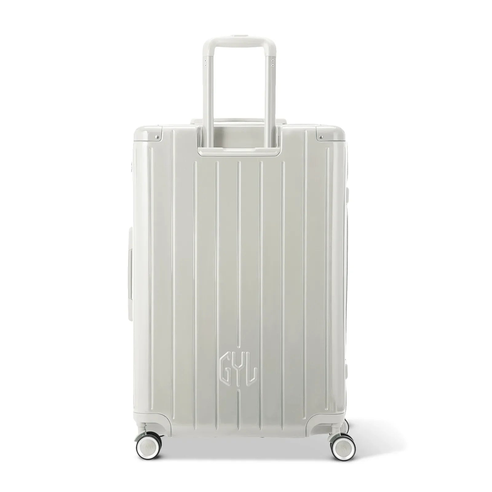 Rear view of the GYL Intemporelle sand hard suitcase with integrated handles and swivel casters. #sand_color