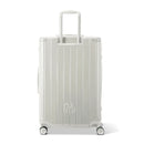 Rear view of the GYL Intemporelle sand hard suitcase with integrated handles and swivel casters. #sand_color