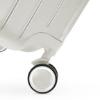 360° double wheel of the GYL Intemporelle sand suitcase with engraving of the GYL logo on the hub. #sand_color