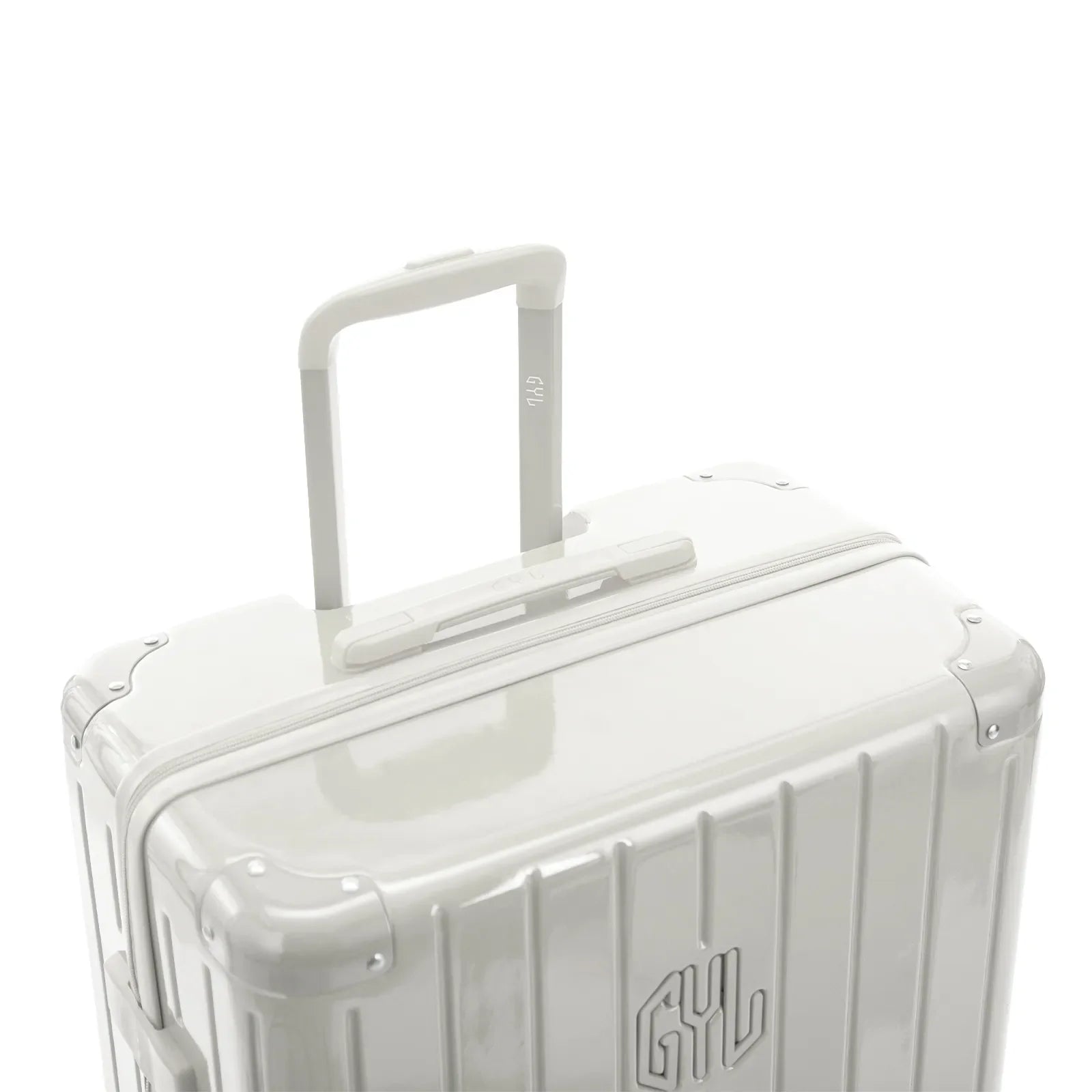 GYL telescopic trolley handle deployed on the Intemporelle sand polycarbonate suitcase. #sand_color