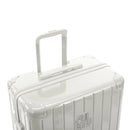 GYL telescopic trolley handle deployed on the Intemporelle sand polycarbonate suitcase. #sand_color