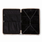 Compartmented interior of the GYL Intemporelle sand suitcase with crossed straps and mesh pockets. #sand_color