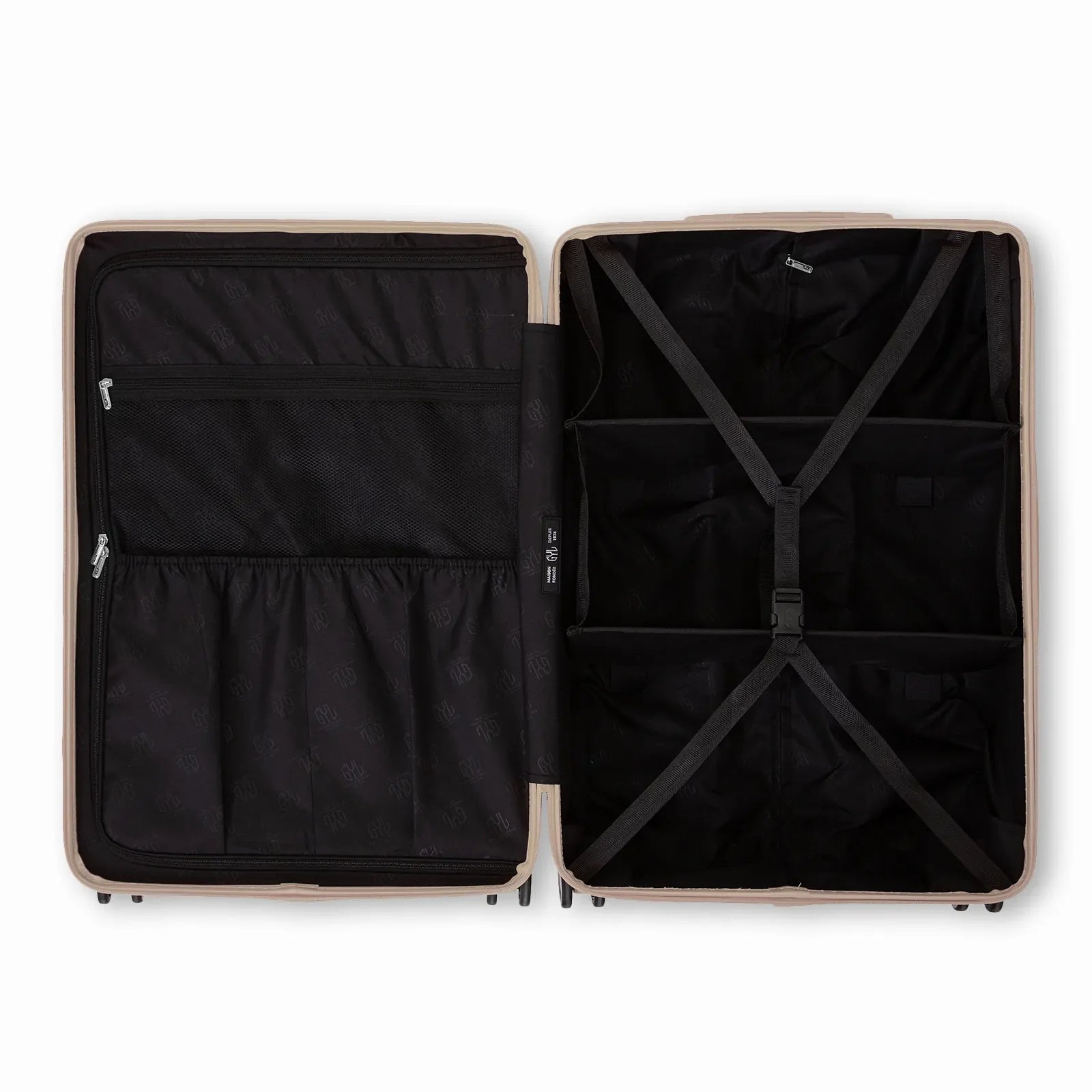 Compartmented interior of the GYL Intemporelle sand suitcase with crossed straps and mesh pockets. #sand_color