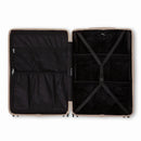 Compartmented interior of the GYL Intemporelle sand suitcase with crossed straps and mesh pockets. #sand_color