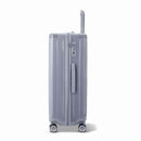 Side view of the GYL Intemporelle silver hard suitcase with telescopic handle and TSA closure. #silver_color