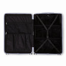 Compartmented interior of the silver GYL Intemporelle suitcase with crossed straps and mesh pockets. #silver_color