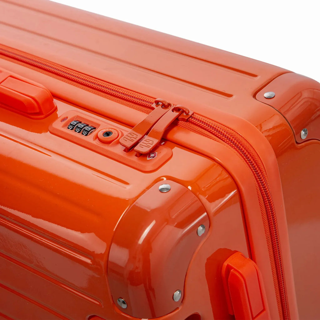 TSA combination closure and GYL double zip slider on the Intemporelle orange hard suitcase. #dark_orange_color