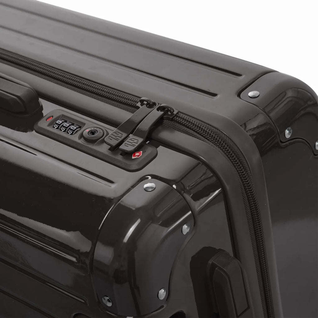 TSA combination closure and GYL double zip slider on the Intemporelle black rigid suitcase. #black_color