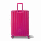 Rear view of the GYL Intemporelle fuchsia hard suitcase with integrated handles and swivel casters. #color_fuchsia