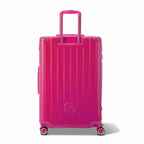 Vista trasera de la maleta rígida GYL Intemporelle fucsia con asas integradas y ruedas giratorias. #couleur_fuchsia