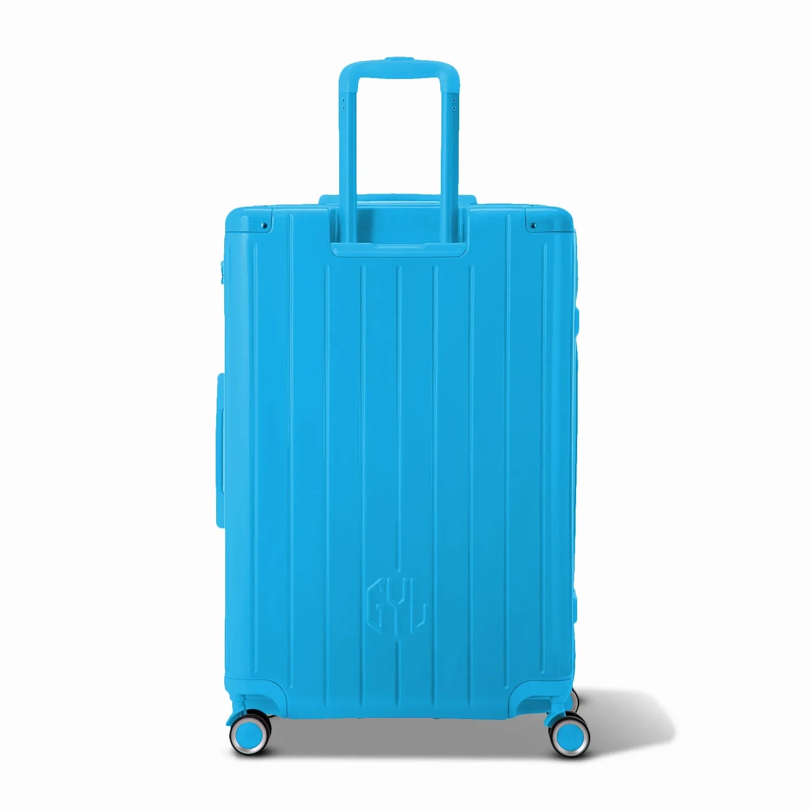 Vista trasera de la maleta rígida GYL Intemporelle menta con asas integradas y ruedas giratorias. #couleur_menthe