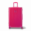 Front view of the GYL Intemporelle fuchsia hard suitcase, embossed logo and 360 degree wheels. #color_fuchsia