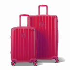 Two GYL Intemporelle fuchsia rigid suitcases, cabin and hold format, with extended trolley handle. #color_fuchsia