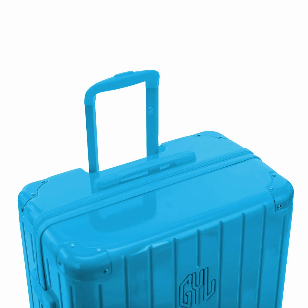 GYL telescopic trolley handle deployed on the Intemporelle mint polycarbonate suitcase. #mint_color