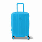 Front view of the mint GYL Intemporelle hard suitcase, embossed logo and 360 degree wheels. #mint_color