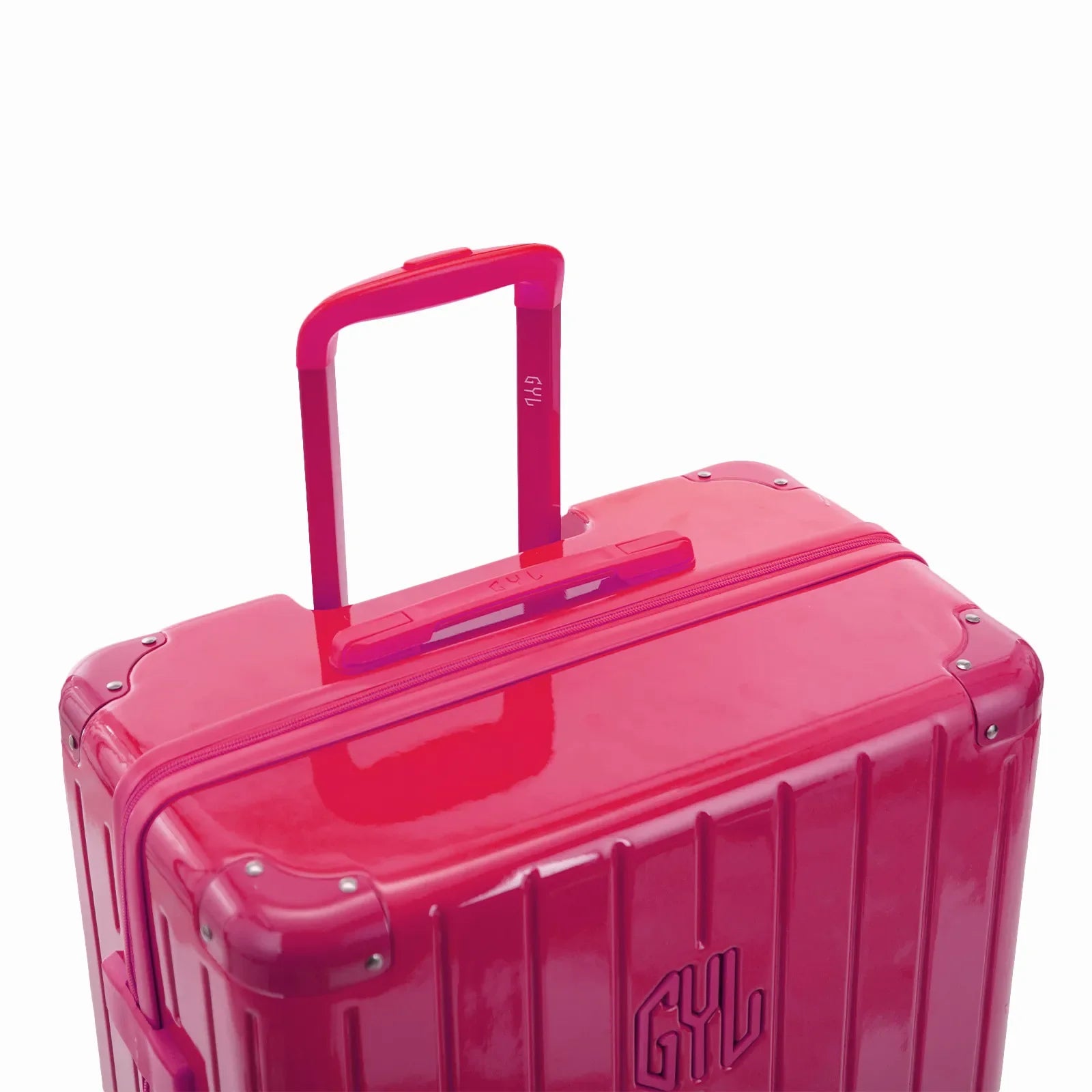 GYL telescopic trolley handle deployed on the Intemporelle fuchsia polycarbonate suitcase. #color_fuchsia