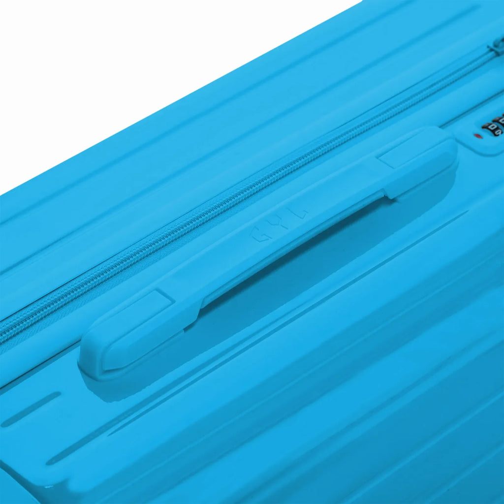 Rigid top handle of the GYL Intemporelle mint suitcase with embossed logo on the top. #mint_color