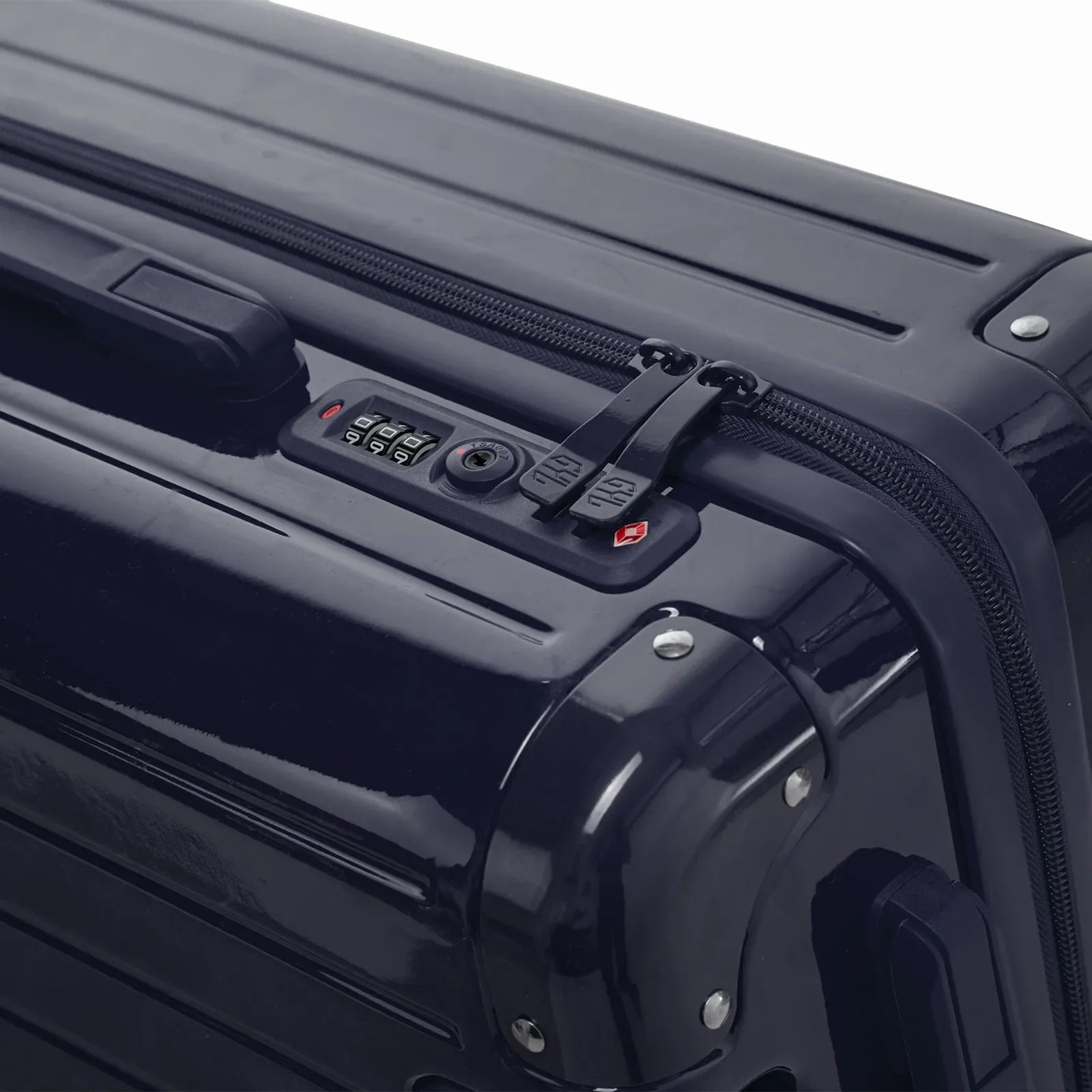 TSA combination closure and GYL double zip slider on the Intemporelle navy rigid suitcase. #navy_color