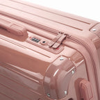 TSA combination closure and GYL double zip slider on the Intemporelle rose gold rigid suitcase. #color_rose gold