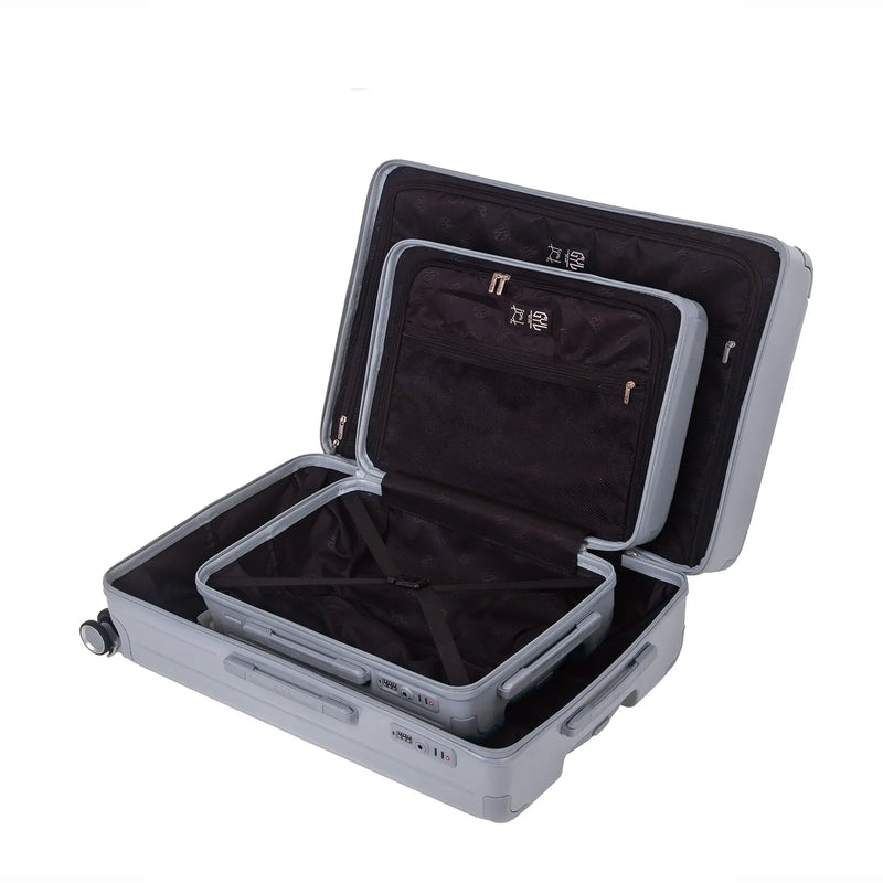 Intérieur compartimenté de la valise GYL Intemporelle argent avec sangles croisées et poches filet. #couleur_argent