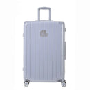 Vue arrière de la valise rigide GYL Intemporelle argent avec poignées intégrées et roulettes pivotantes. #couleur_argent