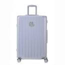 Vue arrière de la valise rigide GYL Intemporelle argent avec poignées intégrées et roulettes pivotantes. #couleur_argent