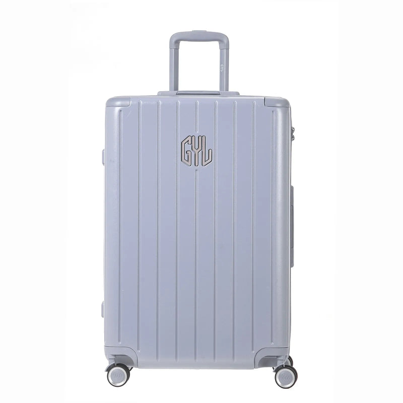 Vue arrière de la valise rigide GYL Intemporelle argent avec poignées intégrées et roulettes pivotantes. #couleur_argent