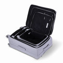 Ensemble de trois valises GYL Évasion en polyuréthane argent, ouvertes et imbriquées les unes dans les autres pour montrer leur conception pratique et leur intérieur spacieux. #couleur_argent