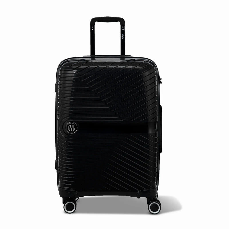 Valise moyenne GYL Signature noire en polypropylène vue de face, avec trolley déployé et roues doubles 360°  #couleur_noir