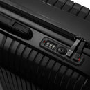 Detail of the integrated TSA lock and sliders on the black Signature suitcase. #black_color