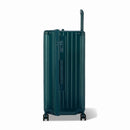 Côté de la valise trunk GYL XL sapin avec serrure TSA intégrée et poignée latérale assortie. #couleur_sapin
