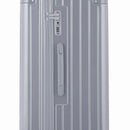 Detalle de la cerradura TSA y el asa lateral de la maleta baúl plateada. #color_plata