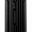 Detalle de la cerradura TSA y el asa lateral de la maleta baúl negra. #color_negro