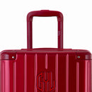 Zoom sur la poignée trolley et le logo GYL de la valise trunk rouge foncé. #couleur_rouge foncé