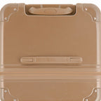 Vue du dessus de la valise trunk GYL champagne en polycarbonate, avec poignée centrale et coins renforcés. #couleur_champagne