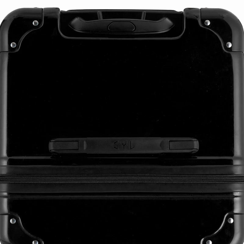Vista superior de la maleta baúl GYL negra en policarbonato, con asa central y esquinas reforzadas. #color_negro
