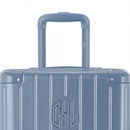 Zoom sur la poignée trolley et le logo GYL de la valise trunk bleu gris. #couleur_bleu grisé